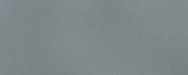 Textured, grainy background featuring a gradient from light to dark grey