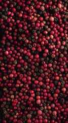 A close-up of a pile of red berries