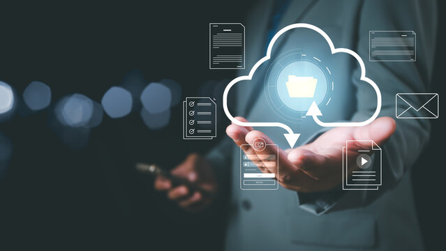 Businessman holding virtual cloud computing for online document management, Innovation technology, Knowledge, Searching for new idea to development digital document system, digital file storage, DMS.