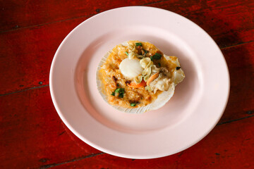 grilled scallops shell with butter and garlic.