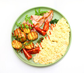  Appetizing omelette with potatoes, bacon and fresh vegetables