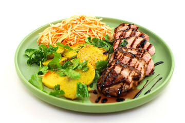 Tender duck fillet with sauce, potatoes and Korean-style carrots