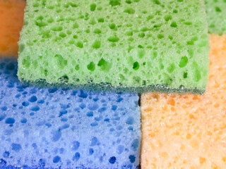 Scrubbing Spectrum. A spectrum of sponges from blue to yellow. Uses for Color theory discussions, art projects.