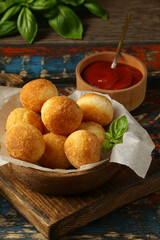 traditional Italian arancini with cheese and basil