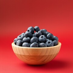 Fresh healthy blueberries fruit on red background
