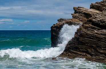 waves crashing on rocks