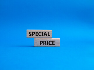 Obraz premium Special Price symbol. Concept word Special Price on wooden blocks. Beautiful blue background. Business and Special Price concept. Copy space