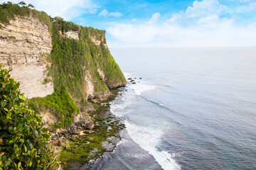 Beautiful view of Uluwatu rock at sunset in Bali, Indonesia