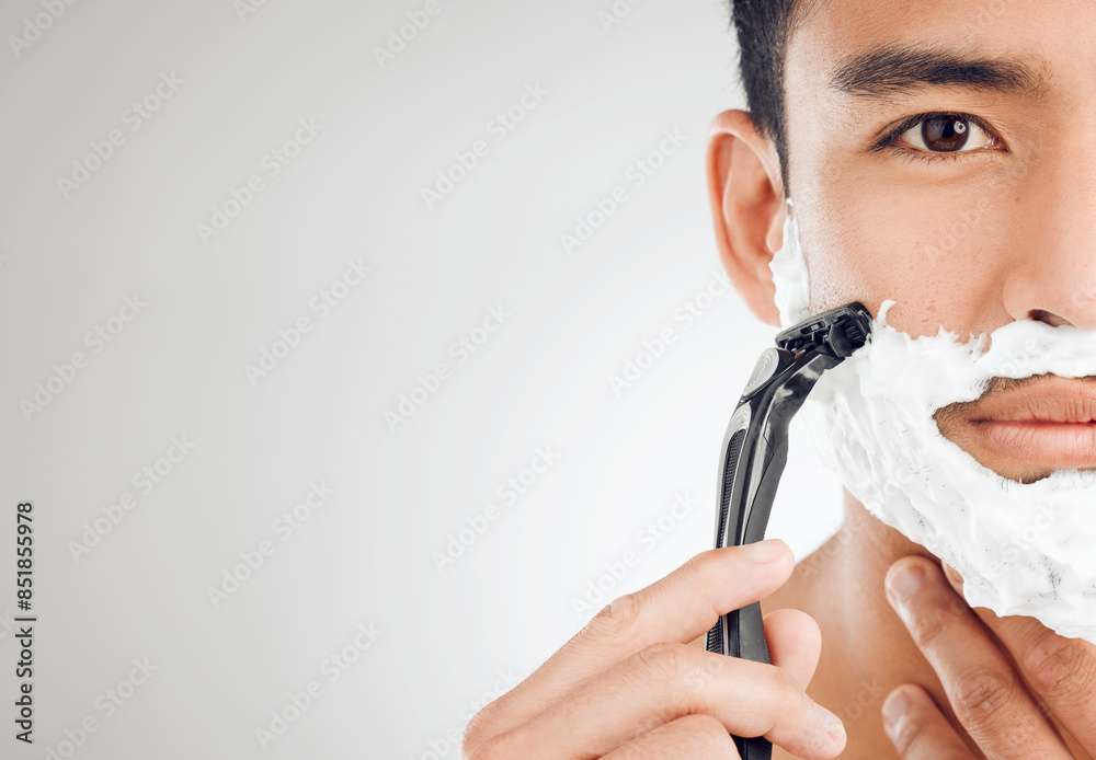 Poster Man, razor and foam in studio, grooming and half face for hair removal or epilation. Male person, mockup space and shave beard or facial treatment, cleaning routine and blade on white background