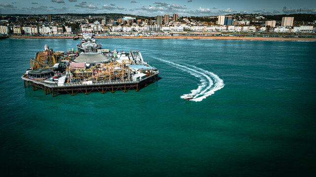 Fototapeta Aerial view of Brighton pier on a sunny day in summer. Brighton, East Sussex, UK