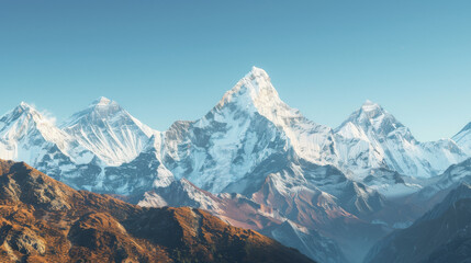 Fototapeta premium landscape photograph of snow-capped mountains against a clear blue sky