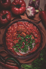 Chashushuli, a traditional Georgian dish, spicy, stewed meat with tomatoes and spices, homemade, no people,