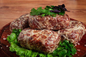 raw apkhazura, a dish of Georgian cuisine, meat balls, minced meat wrapped in a fat net, seftalia, homemade, no people,