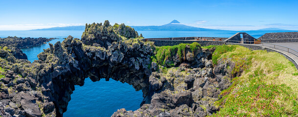 Natural arch of Velas next to the sea. São Jorge Island-Azores-Portugal.