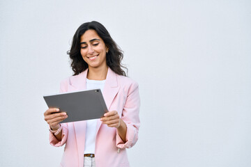 Smiling young middle eastern Israel businesswoman using tablet pc online application for work...