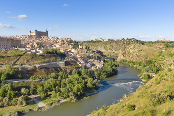 view of the alcazar of toledo and the tajo river