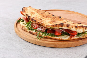 Sandwich pizza with prosciutto