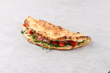 Sandwich pizza with prosciutto