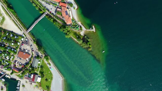 Torbole Lake Garda Top View, Scenic Blue Water and Italian Town, Idyllic Summer Vacation Destination, Clear Sky and Coastal Road Background