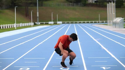 Runner with Sunglasses Injures Leg in Pain While Training on Athletic Track