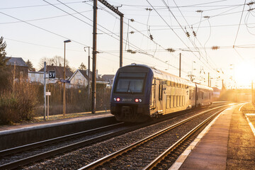 Naklejka premium Train arriving in railways station