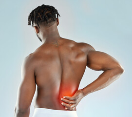 Fitness, back pain and black man in studio with injury, muscle inflammation or strain on blue background. Red overlay, body and athlete with sprain glow, health problem or exercise accident.