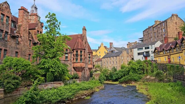 Dean Village in the historic  Edinburgh, Scotland. Slow panning motion over the Water of Leith.