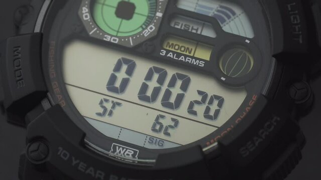 Macro close up of a tactical digital watch face functioning