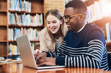 People, students and laptop in library for research, education and exam preparation on campus. Man, woman and together with tech for studying, knowledge and learning on internet at university