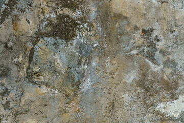 An old wall, the texture of a painted concrete wall. an abstract background covered with dirty old paint.