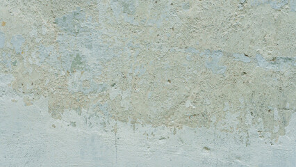 An old wall, the texture of a painted concrete wall. an abstract background covered with dirty old paint.