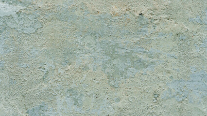 An old wall, the texture of a painted concrete wall. an abstract background covered with dirty old paint.