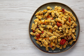 Homemade Baked Boursin Pasta on a Plate, top view. Flat lay, overhead, from above. Copy space.