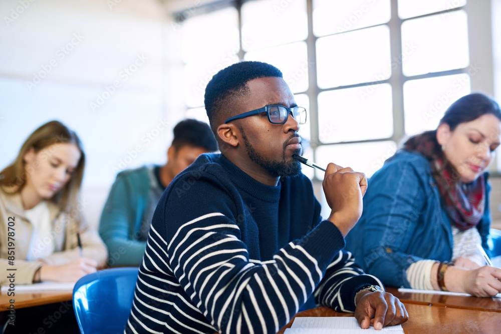 Poster Student, thinking and black man in university classroom for education, test or exam. Idea, college and studying in lecture for problem solving, doubt or brainstorming for learning knowledge at school