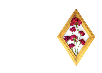 Beautiful artistic wooden frame with dried red roses, Wall art