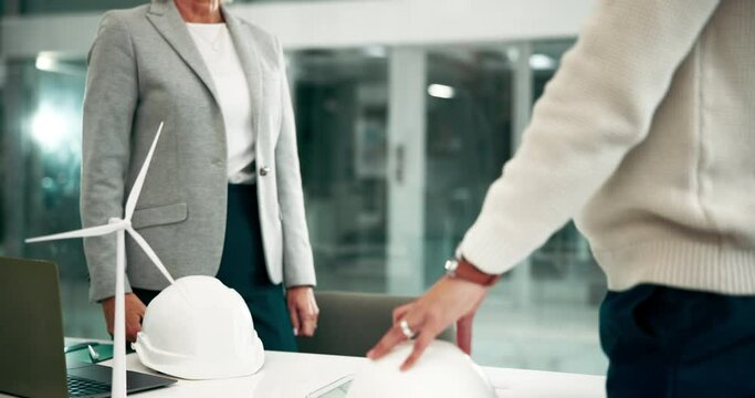 Deal, handshake and renewable energy with business people in construction office for b2b partnership. Building, contract or meeting with architect and engineer shaking hands at work for thank you