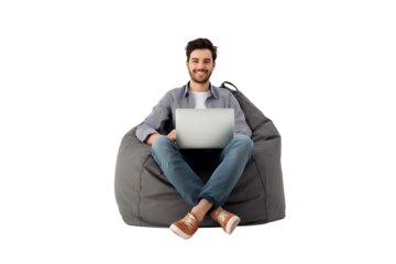young man sit in bag chair working on laptop isolated on transparent background