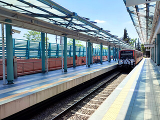 Eirini (Irini) train station in Athens, Greece. Photo of the Eirini (Irini) train station, a station on Athens Metro Line 1, which opened on 3 September 1982 and renovated in 2004.