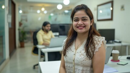 A young woman sits at her desk and smiles at the camera. AI.