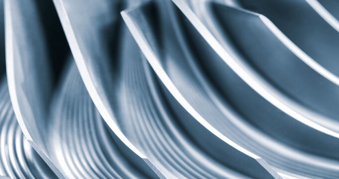 Part of a metal turbine printed on a 3D printer, new additive technologies concept background