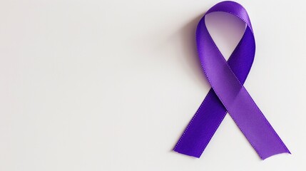 A purple ribbon symbolizing support for various causes like animal abuse Alzheimer s disease domestic violence epilepsy lupus sarcoidosis Crohn s disease and pancreatic cancer stands out ag