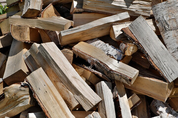 The energy crisis. Birch firewood stacked in a pile.