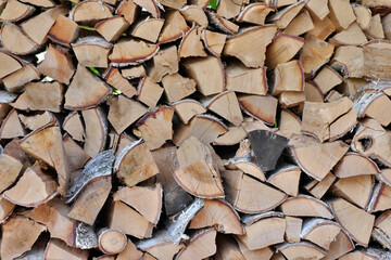 The energy crisis. Birch firewood stacked in a pile.