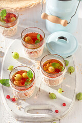 Tasty lemonade made with ice and fresh fruit.