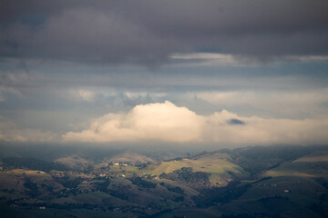 Fototapeta premium clouds over the mountains