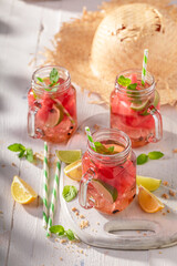 Healthy and tasty lemonade with mint, sugar and ice.
