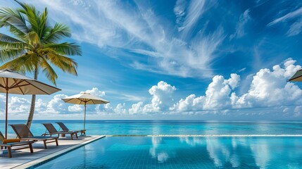 Obraz premium A breathtaking landscape featuring a swimming pool under a blue sky with fluffy clouds, set in a tropical resort hotel in the Maldives. The scene exudes relaxation and peaceful vibes