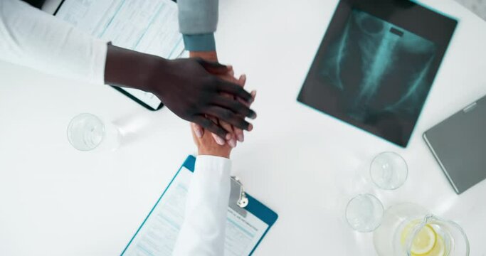Medical, stack and doctors with hands in hospital for meeting, report and collaboration. Top view, xray and healthcare documents with gesture for radiology results, people motivation and teamwork