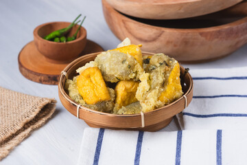 tahu aci or tahu kiwil or Tofu aci is typical Tegal culinary dish made from tofu, aci or tapioca and spices and Then fried until crispy. Perfect for recipe, article, or any cooking contents.