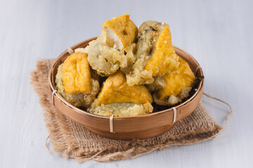 tahu aci or tahu kiwil or Tofu aci is typical Tegal culinary dish made from tofu, aci or tapioca and spices and Then fried until crispy. Perfect for recipe, article, or any cooking contents.